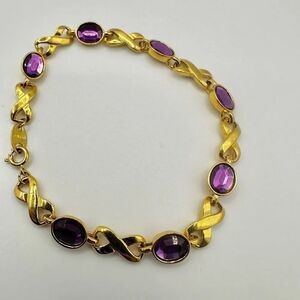 Avon gold tone x purple vintage bracelet